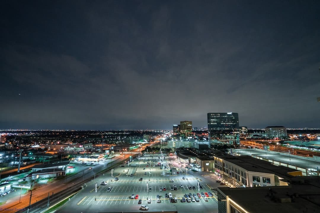 city with high rise buildings during night time — Photo by David French on Unsplash