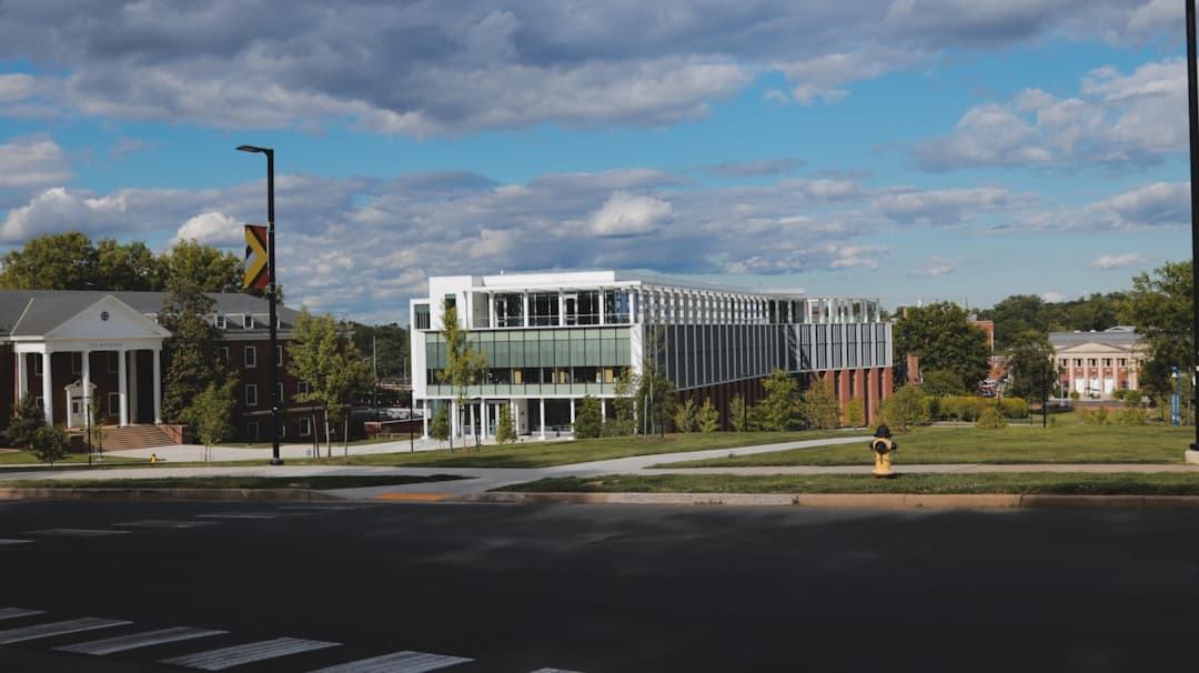 a street corner with buildings and a fire hydrant — Photo by Sparsh Paliwal on Unsplash