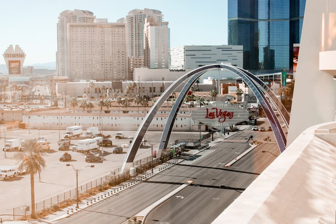 Las vegas skyline with arch bridge and buildings — Photo by Luana Scorsoni on Unsplash