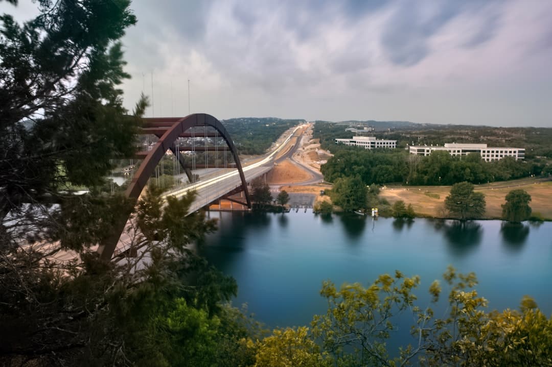 a bridge over a large body of water — Photo by Trac Vu on Unsplash