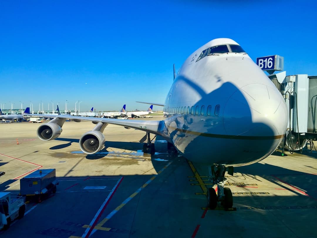 a large jetliner sitting on top of an airport tarmac — Photo by Jared Michael on Unsplash
