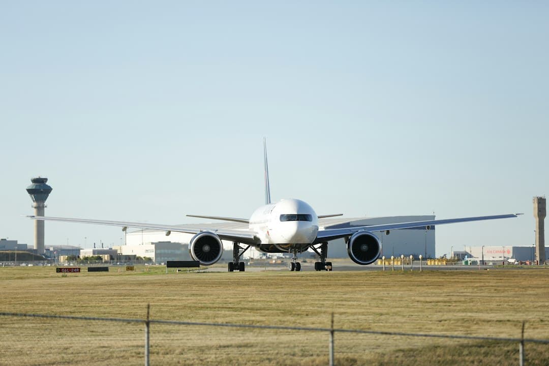 a large jetliner sitting on top of an airport runway — Photo by Michael on Unsplash