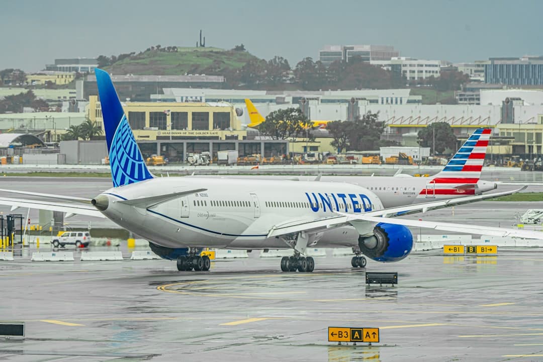 a large jetliner sitting on top of an airport tarmac — Photo by Lukas Souza on Unsplash