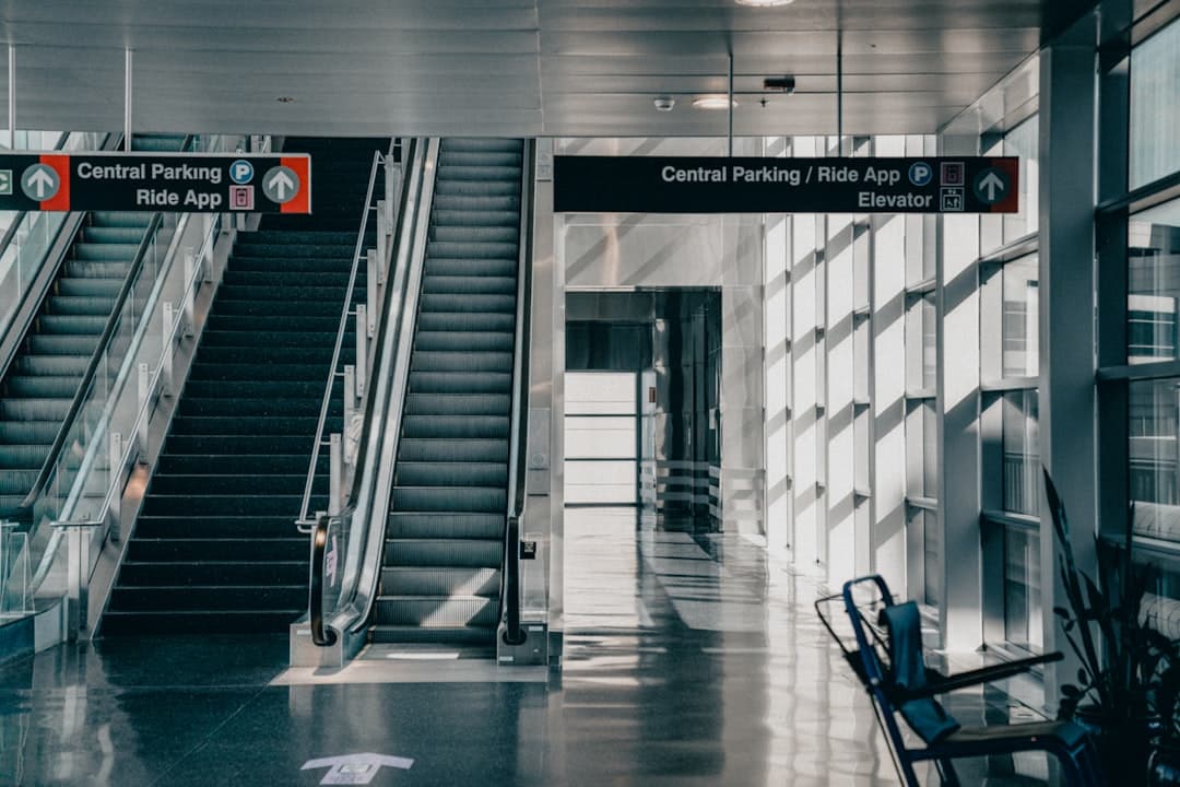 an escalator and stairs in a building — Photo by Juan Ortiz on Unsplash