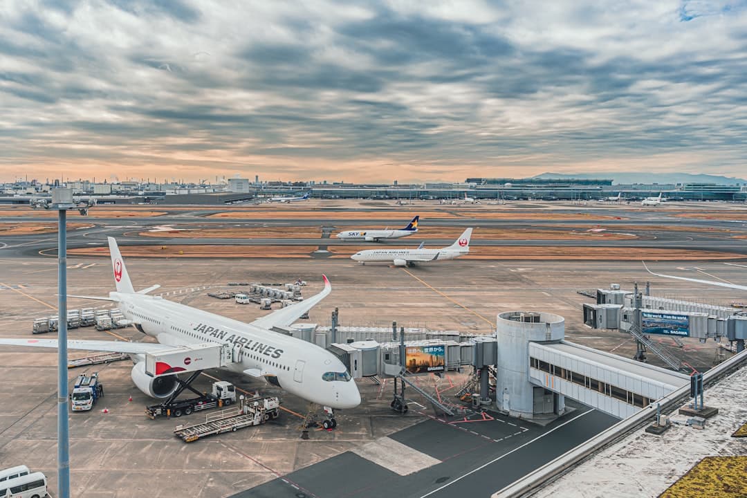 a large jetliner sitting on top of an airport tarmac — Photo by mos design on Unsplash