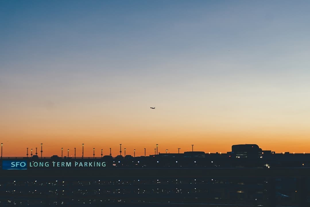 silhouette of city buildings during sunset — Photo by Nic Y-C on Unsplash