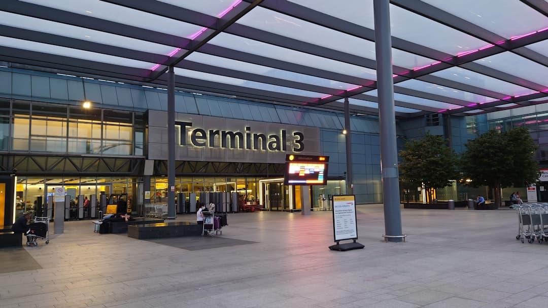 a terminal with a sign that says terminal 3 — Photo by CabService London on Unsplash