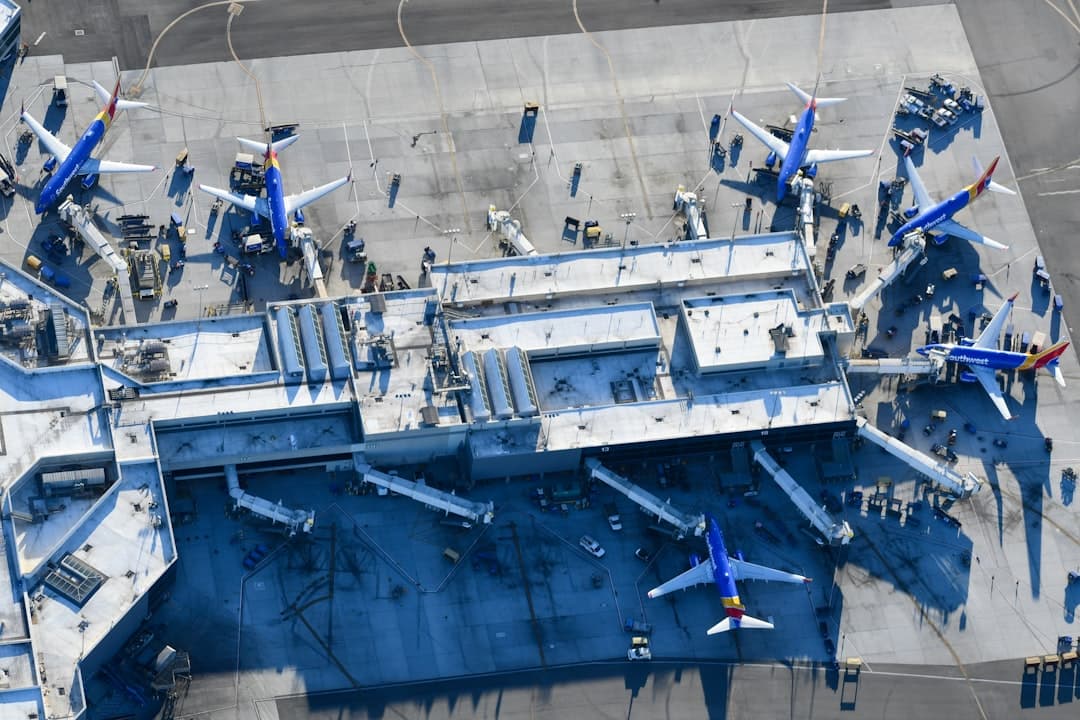 An aerial view of a blue and white airplane — Photo by David Syphers on Unsplash