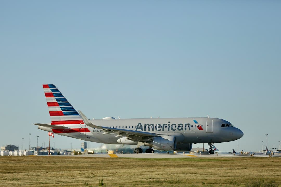a large commercial airplane on a run way — Photo by Michael on Unsplash