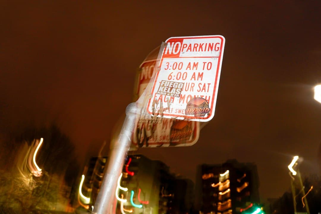 white and red street sign — Photo by Binh Nguyen on Unsplash