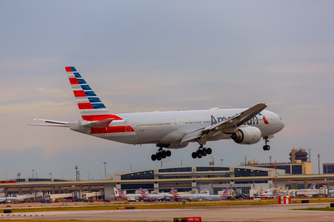 A large jetliner taking off from an airport runway — Photo by Izyan Sultanali on Unsplash