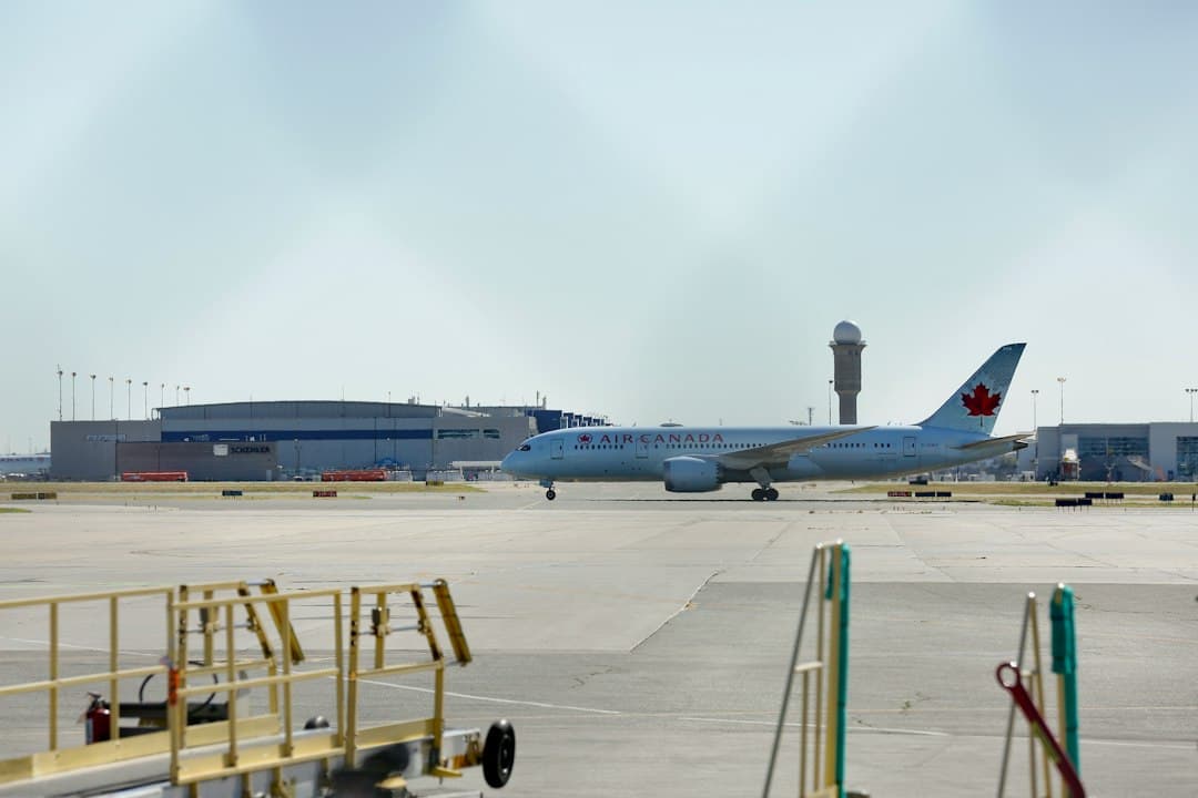 a large jetliner sitting on top of an airport tarmac — Photo by Michael on Unsplash