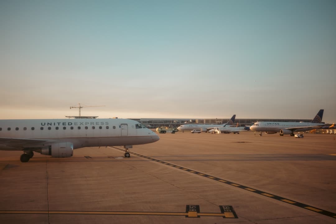 Airplanes sitting on the tarmac during sunset. — Photo by Fabio Sasso on Unsplash