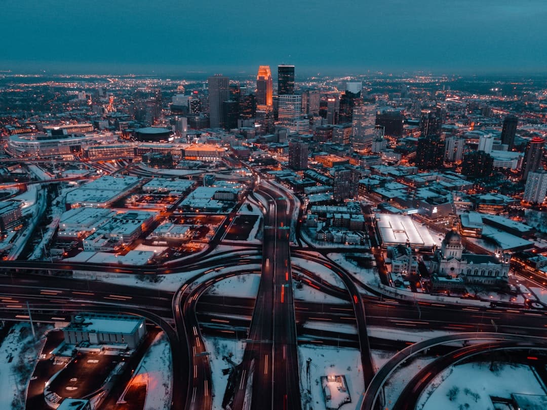 city skyline during night time — Photo by Kevin Nalty on Unsplash