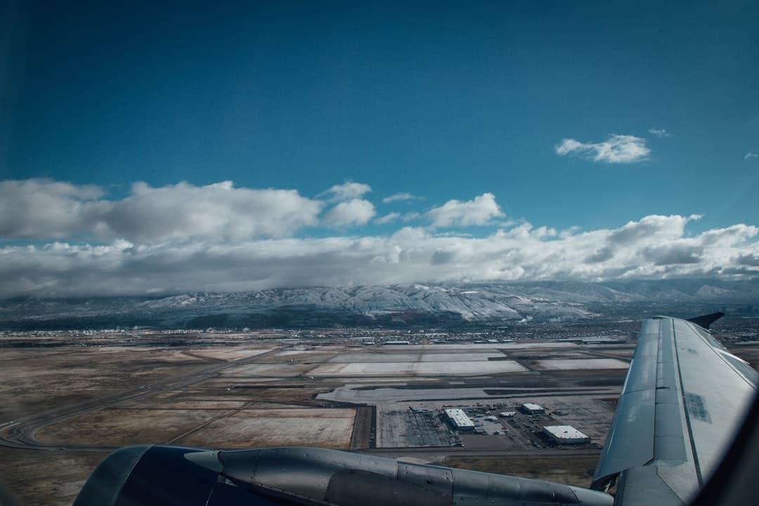 aerial view of city under cloudy sky during daytime — Photo by Christopher Ott on Unsplash