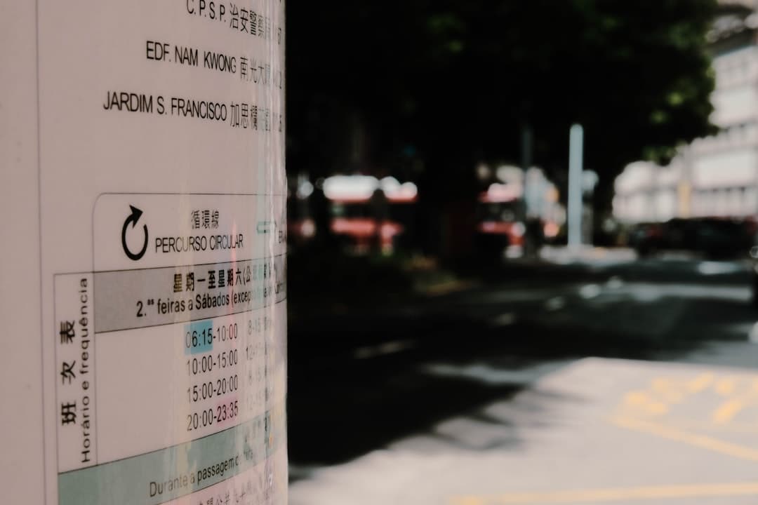 A close up of a street sign on a city street — Photo by MACAU PHOTOGRAPHY on Unsplash
