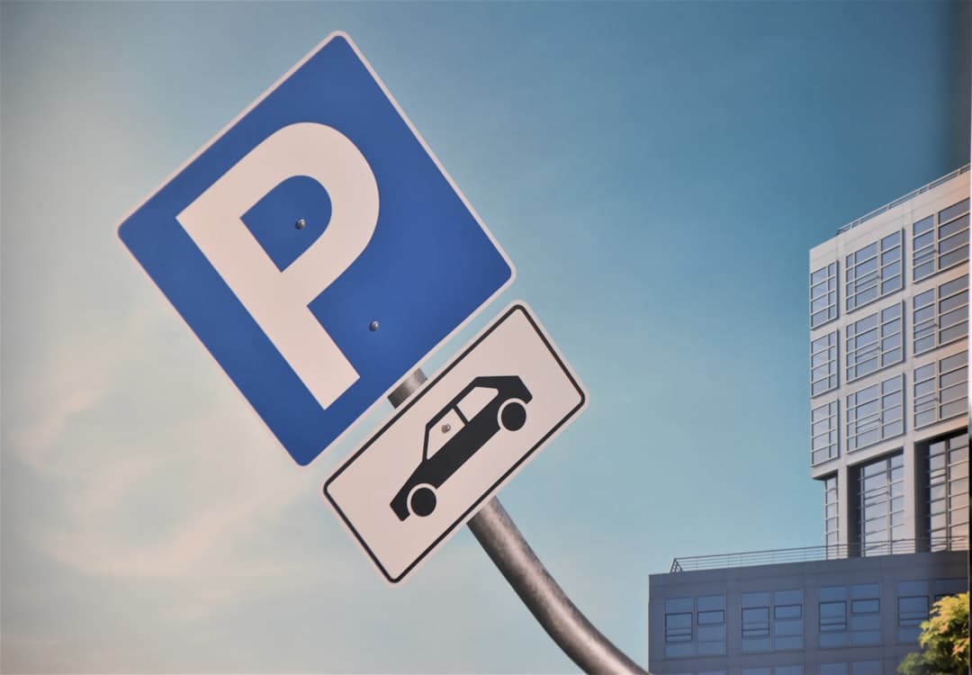 blue and white stop sign — Photo by Waldemar Brandt on Unsplash