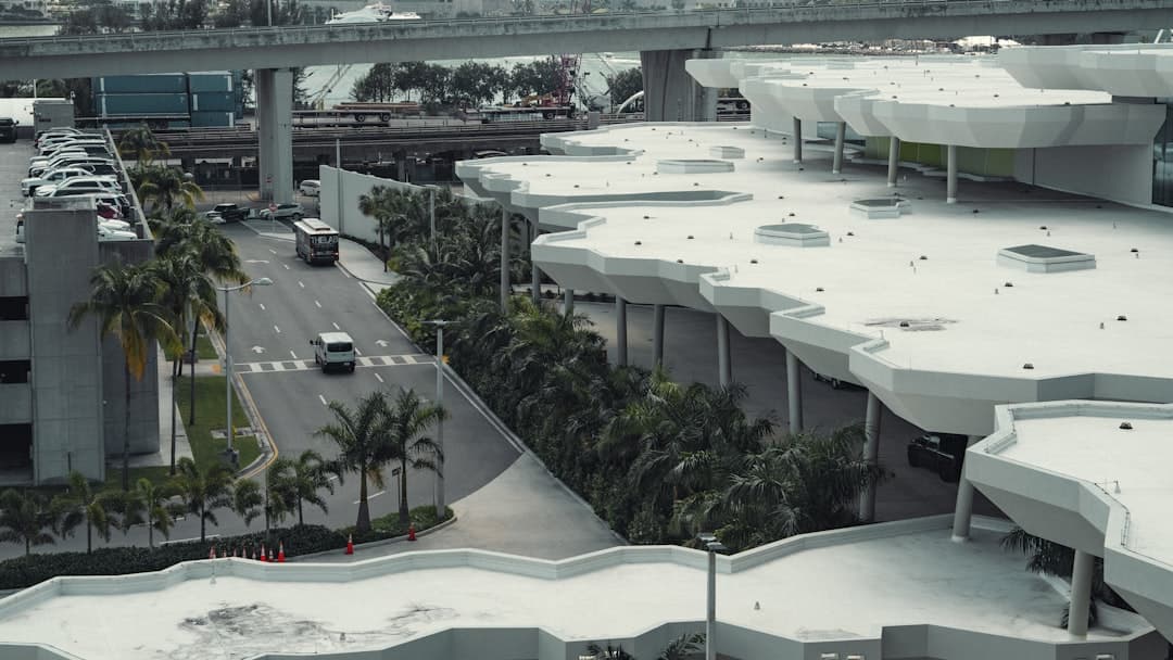 an aerial view of a city with a bridge — Photo by Dennis Zhang on Unsplash