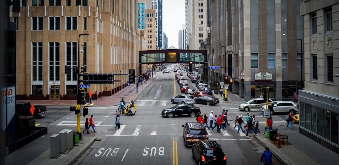 cars on road near buildings during daytime — Photo by Sesha Reddy Kovvuri on Unsplash