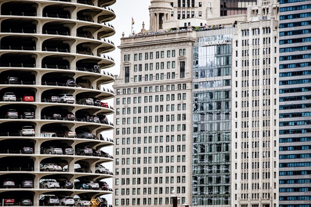 a building with cars parked in front — Photo by Alan Rodriguez on Unsplash