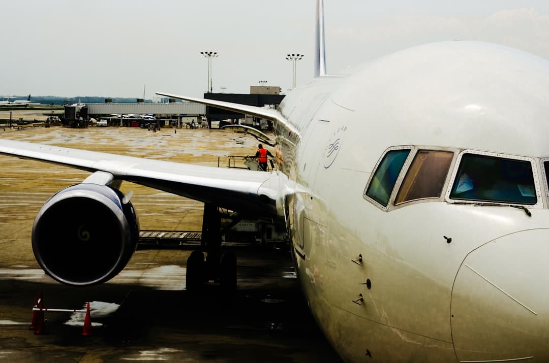 a large jetliner sitting on top of an airport tarmac — Photo by Scott Fillmer on Unsplash