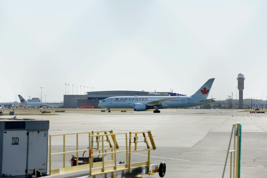 a large jetliner sitting on top of an airport tarmac — Photo by Michael on Unsplash