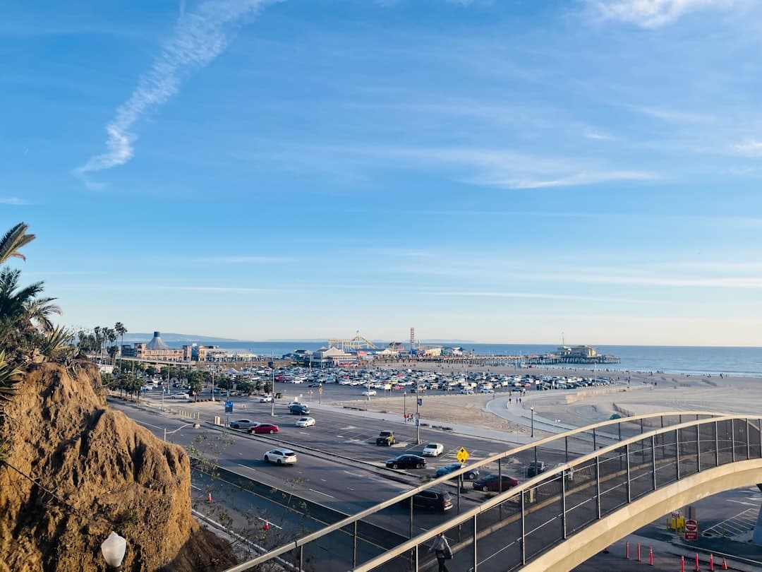A scenic view of traffic and a beach. — Photo by Jaspreet 👑 on Unsplash