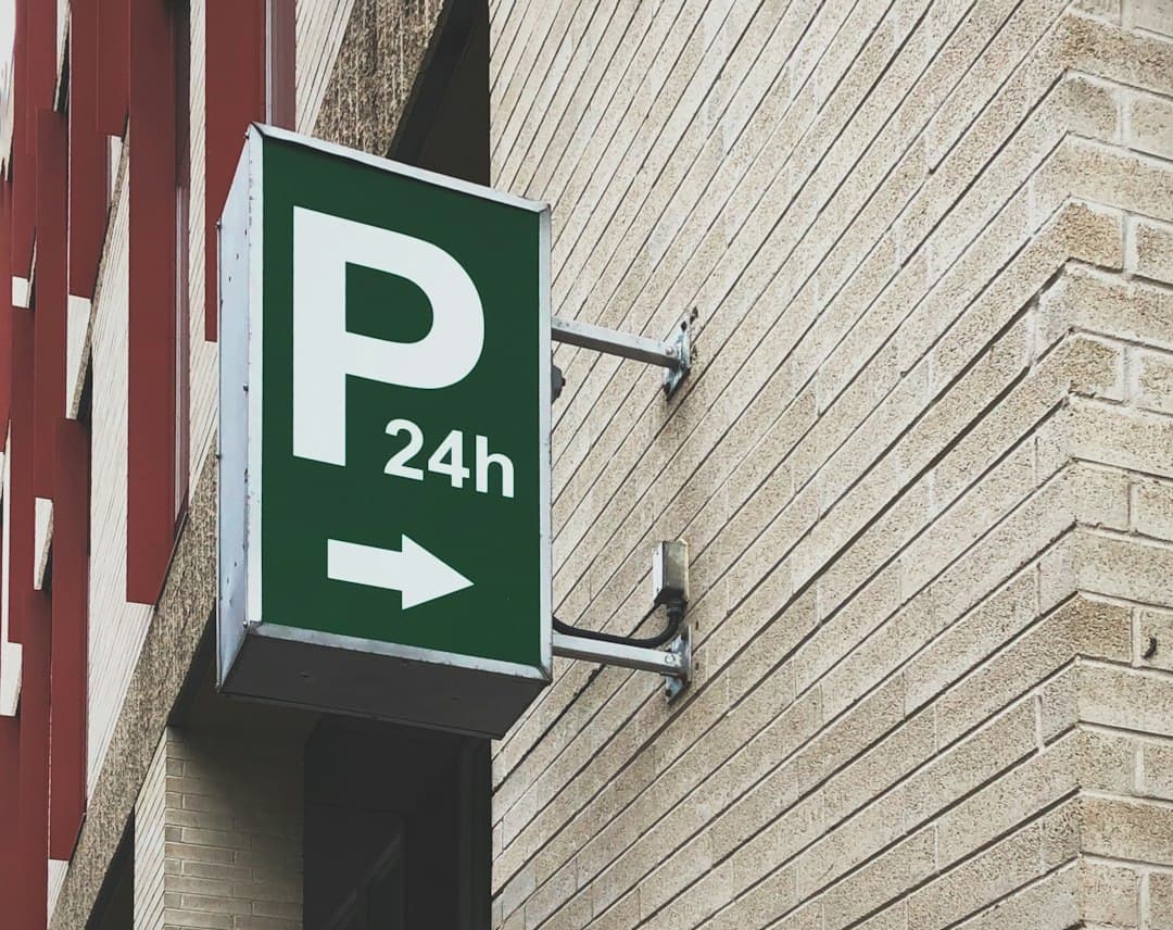 white and green P24h signage — Photo by Compagnons on Unsplash