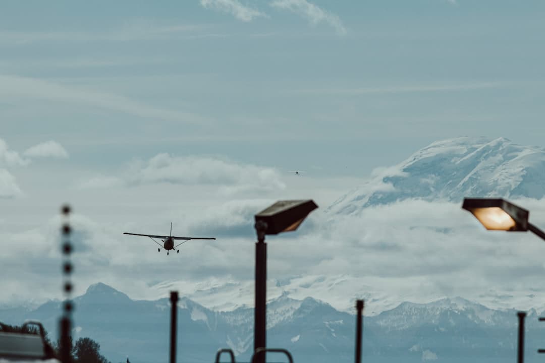brown wooden cross on top of mountain during daytime — Photo by Cody F on Unsplash