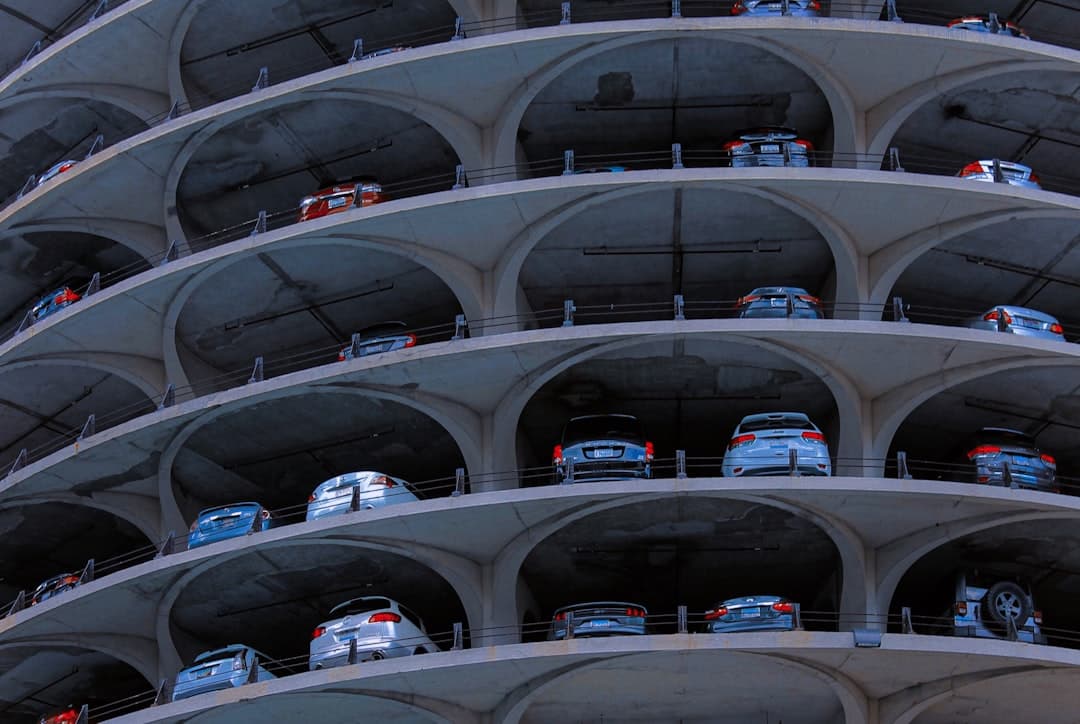 cars parked on parking lot — Photo by Alicja Podstolska on Unsplash