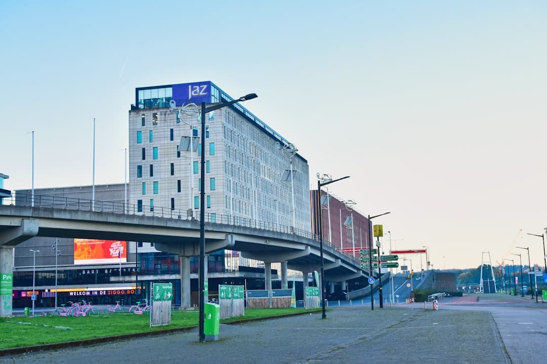 Modern buildings with elevated train tracks — Photo by Vivek on Unsplash