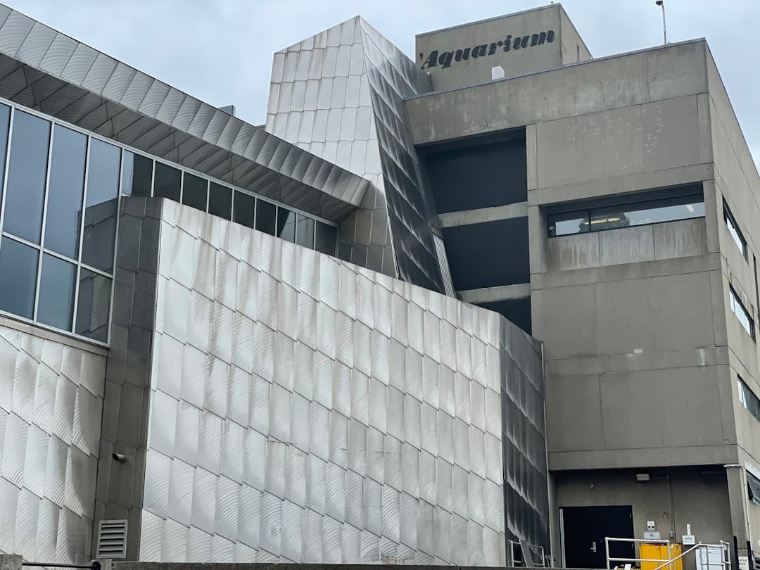 a large building with a clock on the side of it — Photo by Bernd 📷 Dittrich on Unsplash